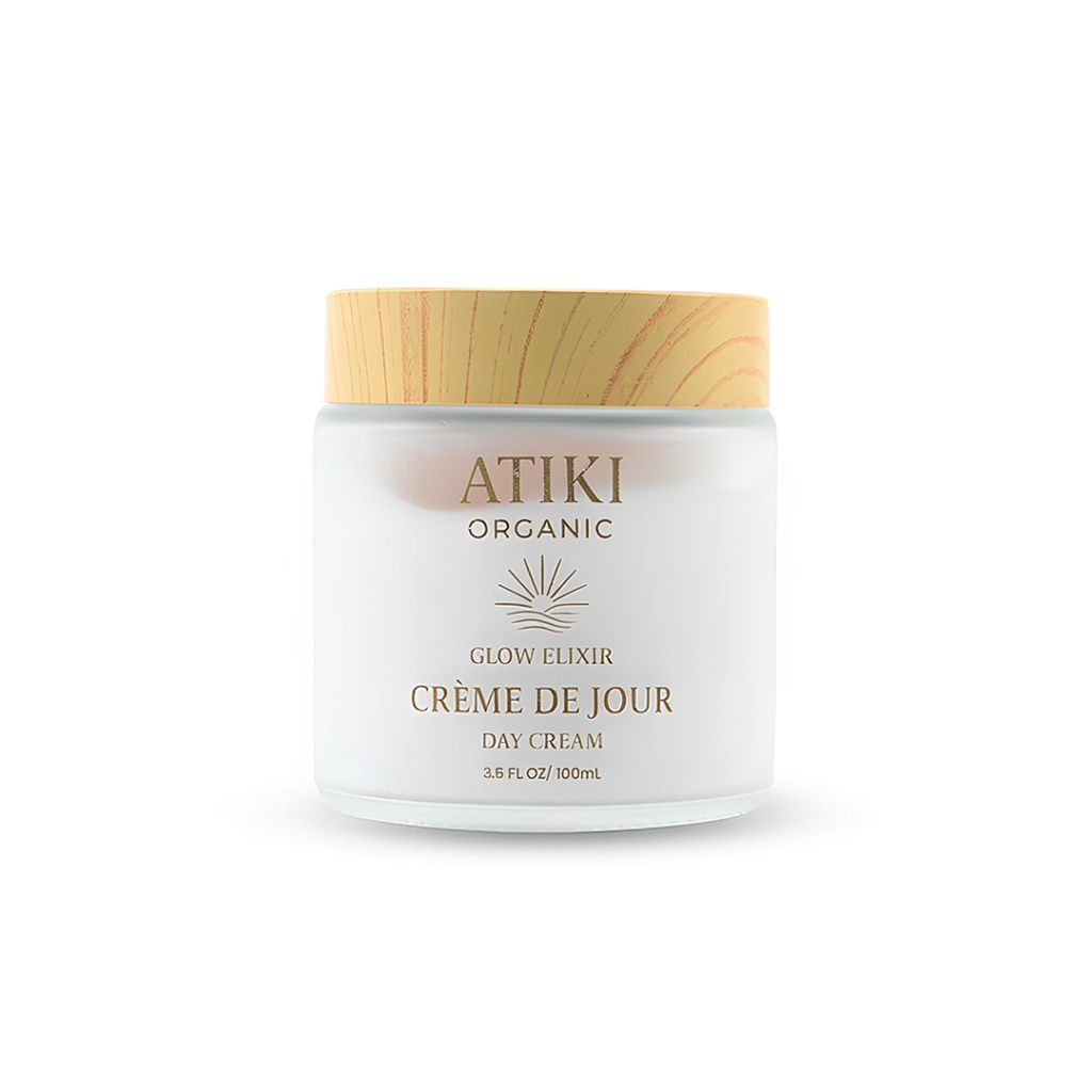 ATIKI Glow Elixir Day Cream is a high-performance daily moisturizer designed to energize, protect, and perfect the complexion. Enriched with firming peptides, deeply hydrating hyaluronic acid, and skin-refining niacinamide, this advanced formula helps improve elasticity, smooth uneven texture, and visibly brighten the skin. Its lightweight, silky texture absorbs beautifully, leaving the skin plumper, more balanced, and naturally luminous — a refined glow that lasts all day. Where botanical care meets modern skin science.